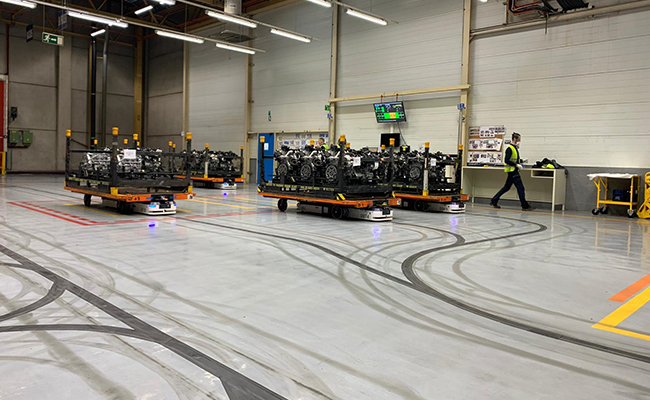 Actualmente, en las instalaciones de Ford se emplean vehículos guiados de manera automática (AGV) por líneas magnéticas.